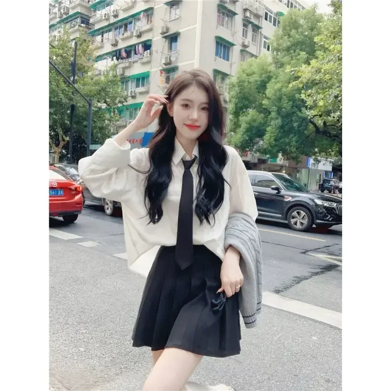 Otoño nuevo Japón mujer moda Corea escuela Jk uniforme estilo universitario chaleco tejido con cuello en V camisa + Falda plisada conjunto de uniforme Jk