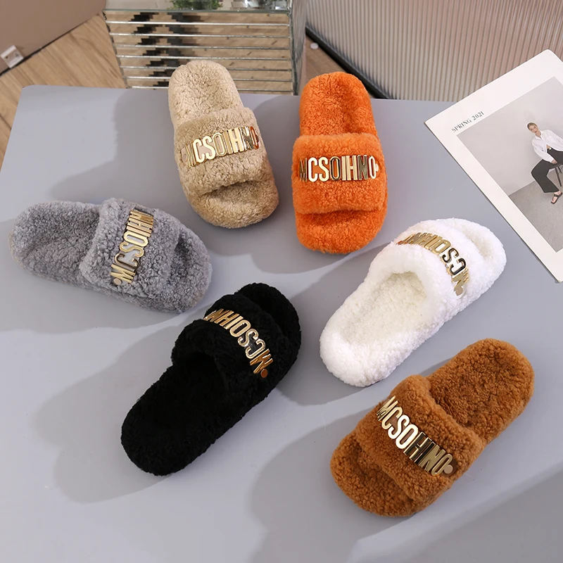 

Sponge cake thick bottom sheep hair slippers women's letter outer one word slippers 2024 new casual flat bottom warm anti slip