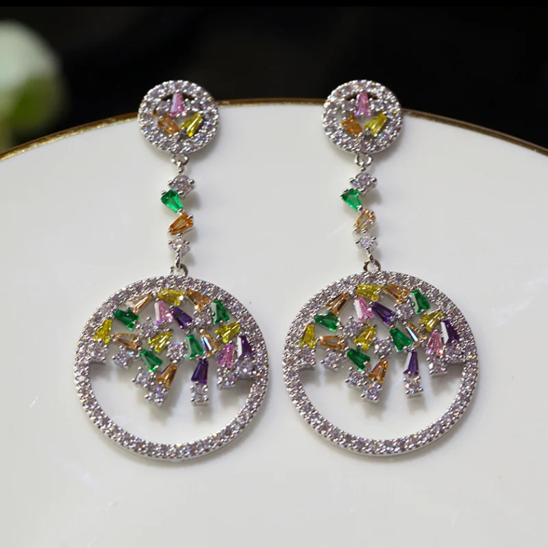 The exquisite earrings of a sophisticated woman. The luxurious colored zirconium circle earrings are perfect for fashionable jew