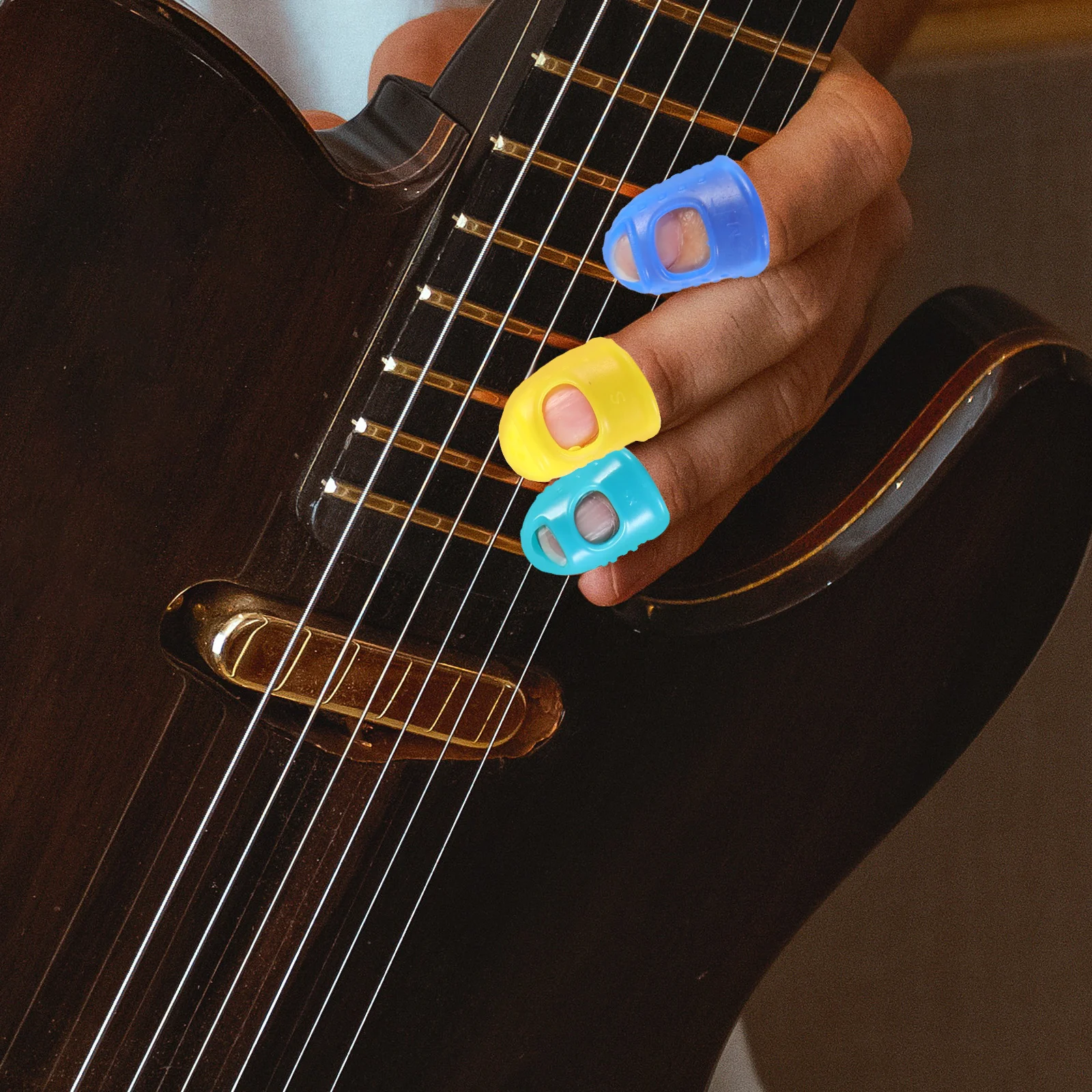 

24 Pieces Silicone Finger Caps S M L Sizes Gray Transparent Sky Blue Dark Blue Colors for Guitar Paperwork Office Supplies Safe