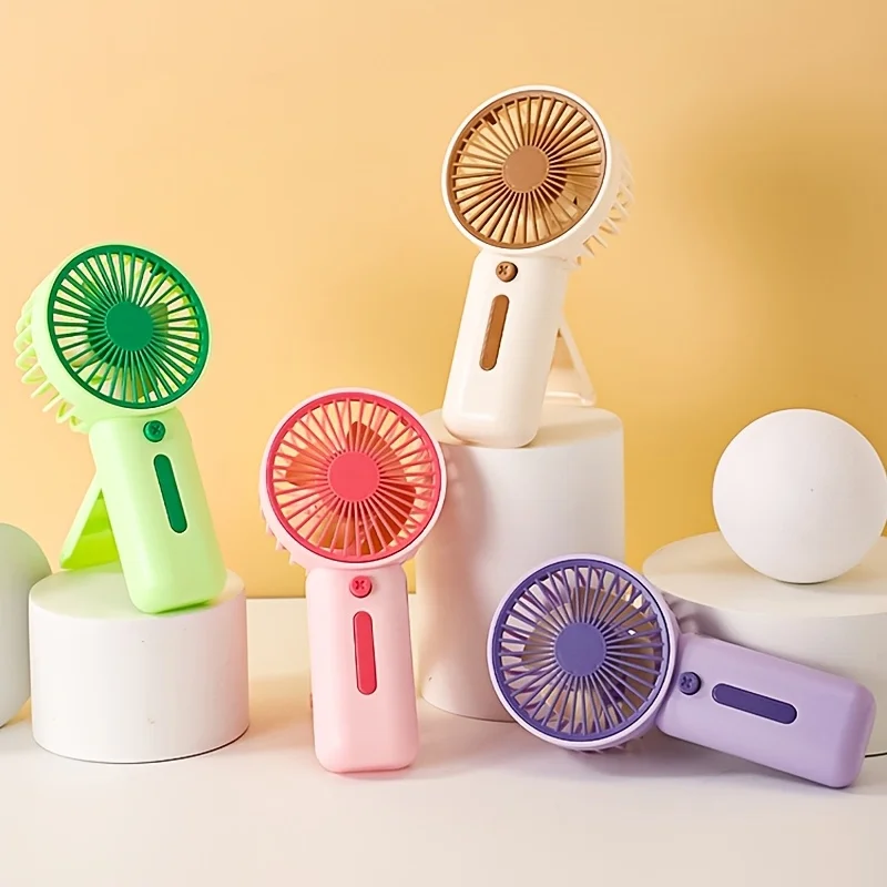 Q1B_Mini ventilateur en option quatre couleurs, portable et compact, ventilateur portatif sans batterie adapté à divers scénarios