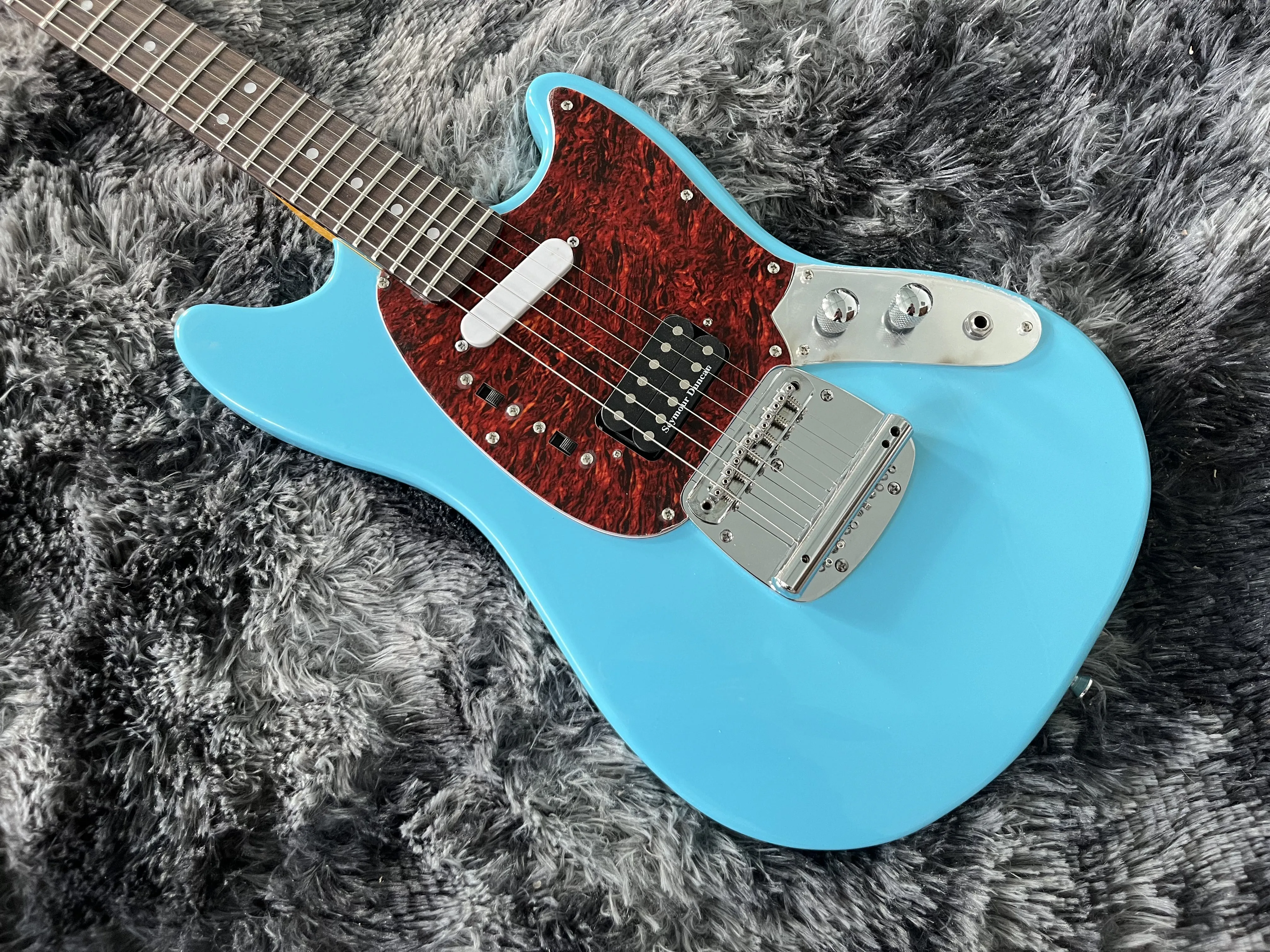 China Electric Guitar Tremolo System Blue Color Mustang