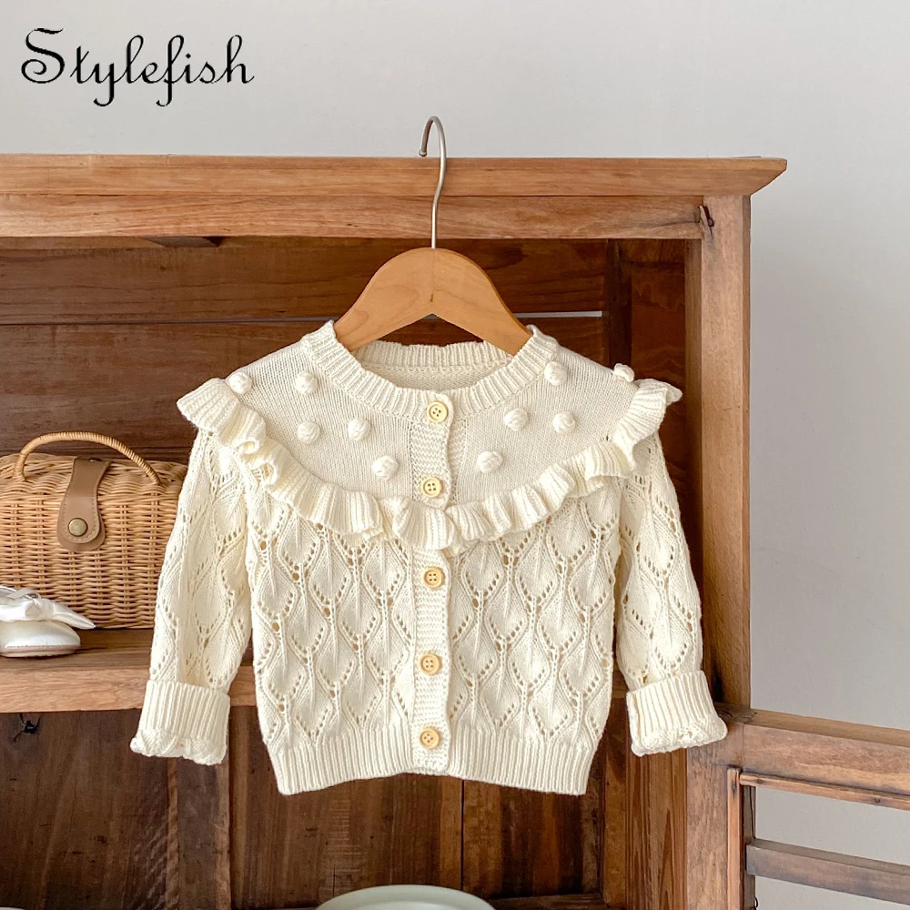 Autumn new style 0-3 year old baby clothing for girl handmade balls hollow out knitted coat long-sleeved cardigan