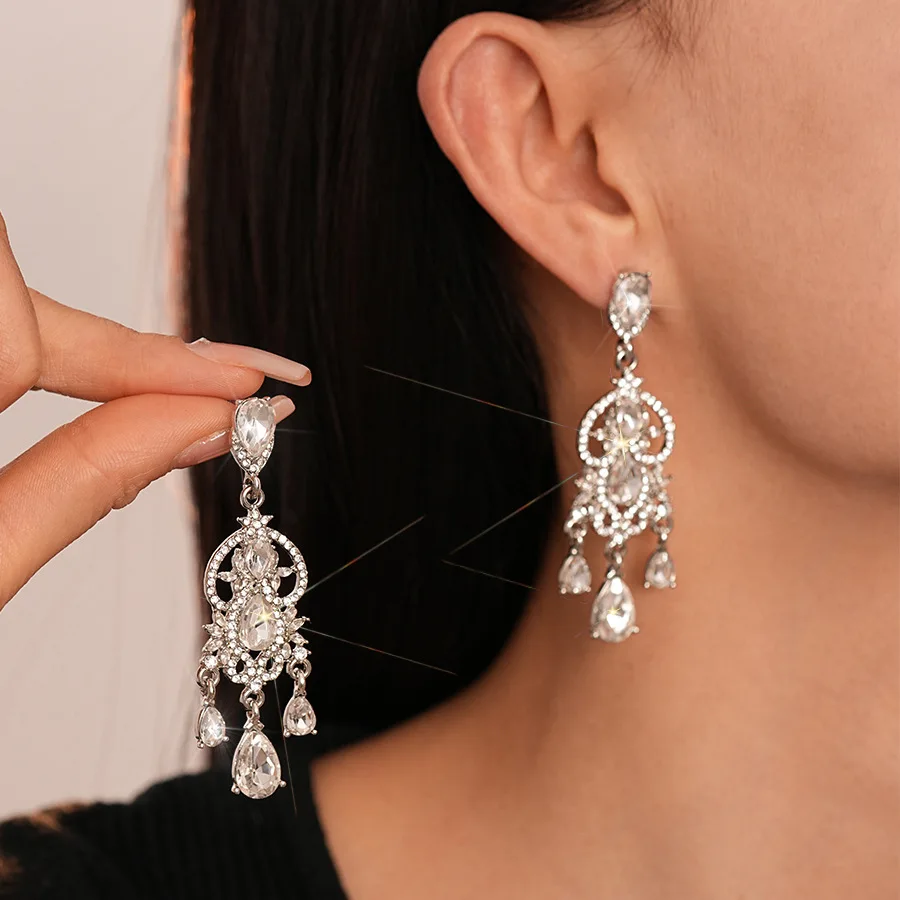 Super flash light luxury style diamond-set water drop geometric silver needle earrings, personality, temperament high-end women
