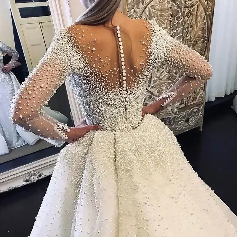 

Customized High-end Pearl Heavy Beaded Long Sleeve Wedding Dresses Dubai Wedding Gowns With Detachable Tail 2025