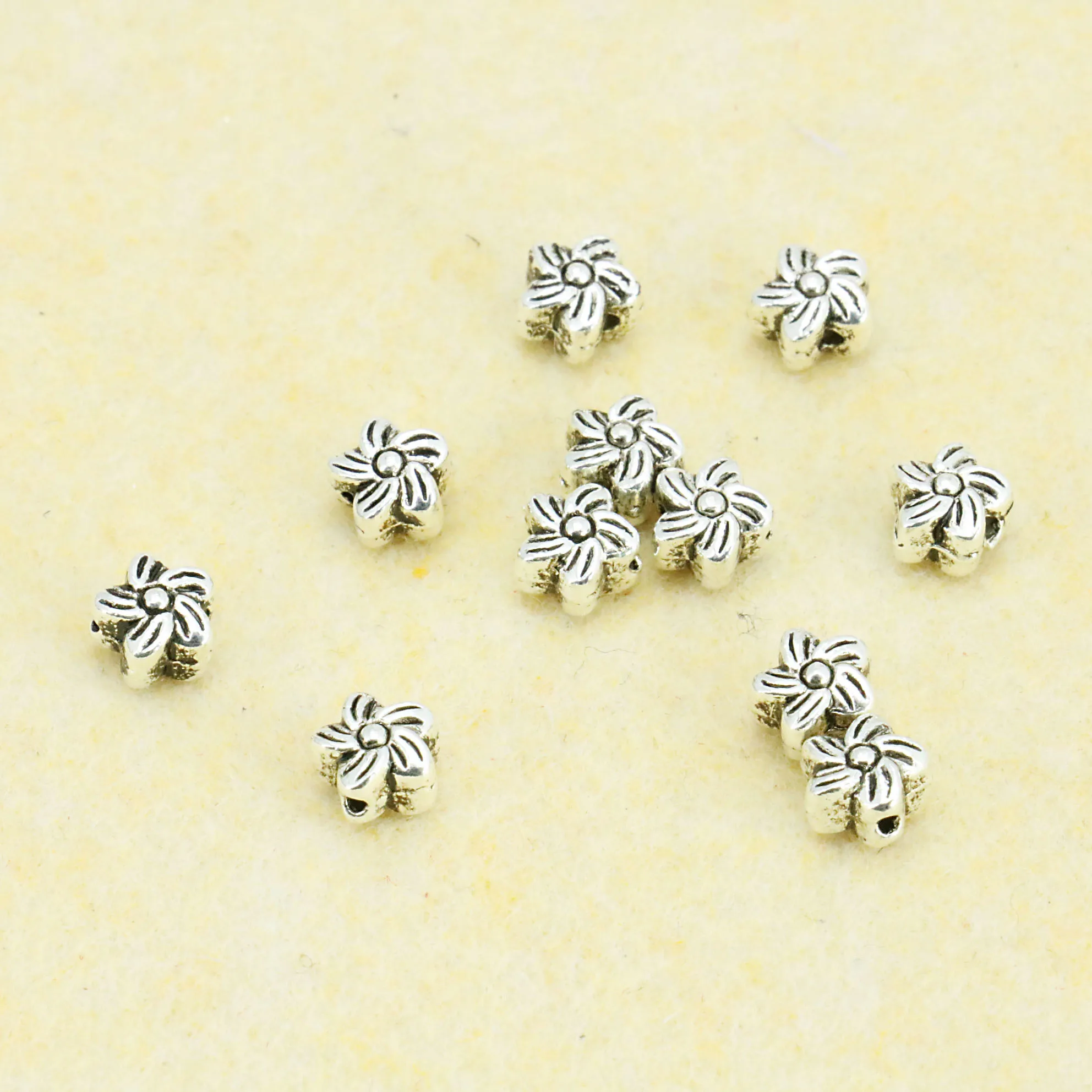 

1PCS New 7x5mm Round Beads Sun Flower Carved Spacer DIY Metal Findings Fashion Jewelry Making Accessories For Necklace Bracelet