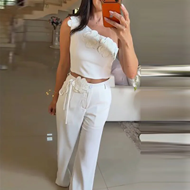 

Сексуальный комплект из топа с асимметричным вырезом на плече и длинных брюк для женщин: повседневный костюм из 2 предметов без рукавов с объемной вышивкой, однотонный, элегантный.