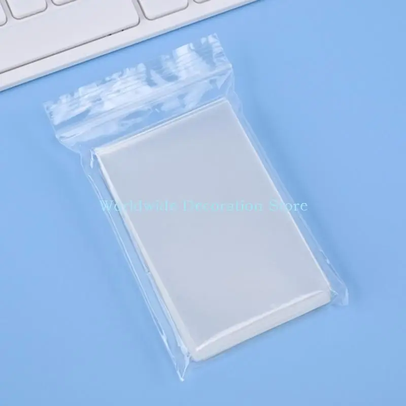 Q39b 50 stcs Transparante kaartfilm Clear Korea Mouwen Foto holografische beschermkaarten Holografische beschermerfilm