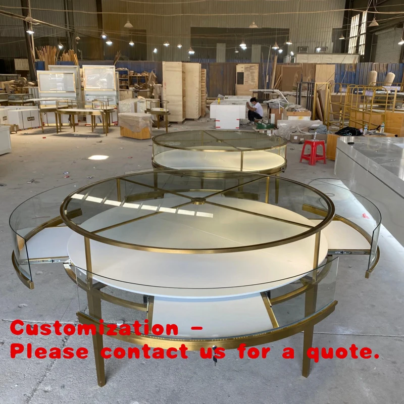 

custom.Luxury Jewelry Display Cabinet Gold Jewelry Glass Counter Display Stainless Steel Round Product Display Cabinet