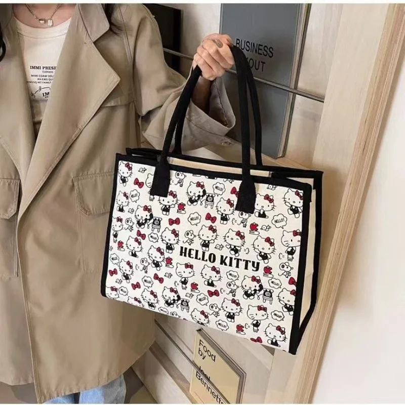 

Холщовая сумка большой емкости с героями мультфильмов, новинка 2026, модная большая сумка Hello Kitty для прогулок, сумка через плечо для мамы