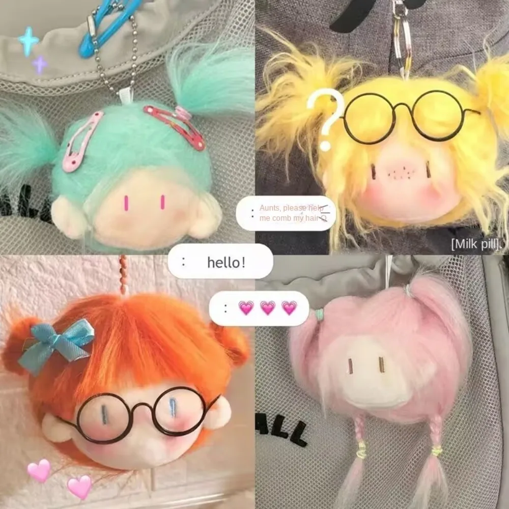 Peluche cheveux longs poupée pendentif dessin animé conception poupée fille poupée fille tête porte-clés poupée mignonne