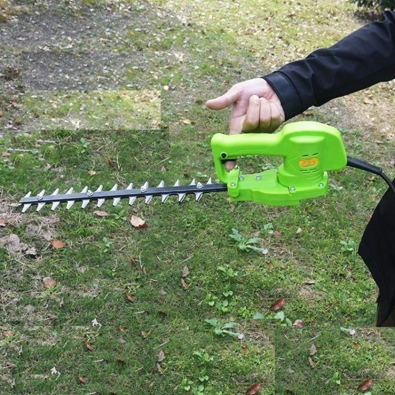 Hedge trimmer, hand-held electric hedge trimmer, garden shrub trimmer