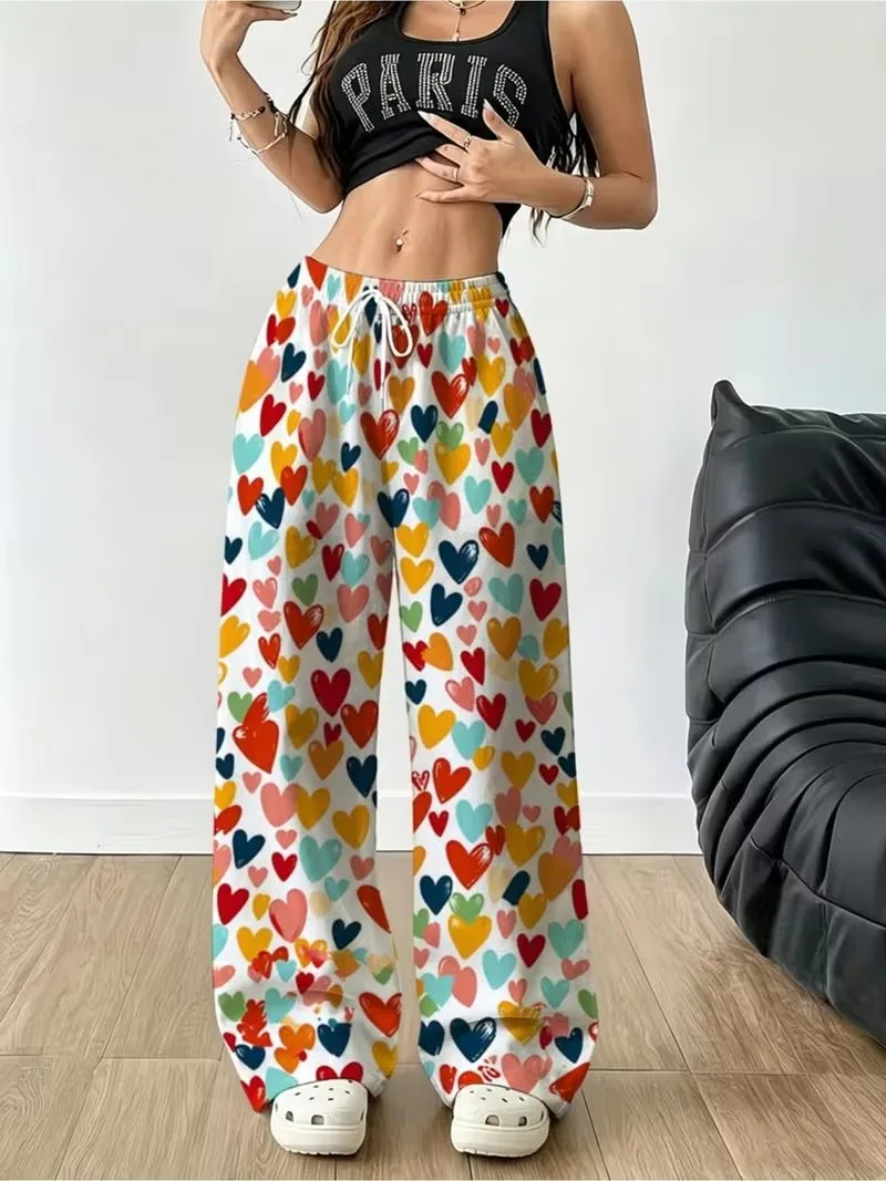 3D heart-shaped printed pants, women's new autumn sports pants, fashionable pocket drawstring comfortable versatile pants