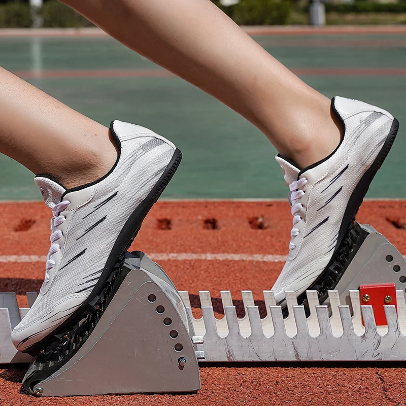 Męskie buty do lekkoatletyki z kolcami Profesjonalne damskie buty sportowe do skoku na długie buty sportowe Lekkie buty chłopięce do skakania na