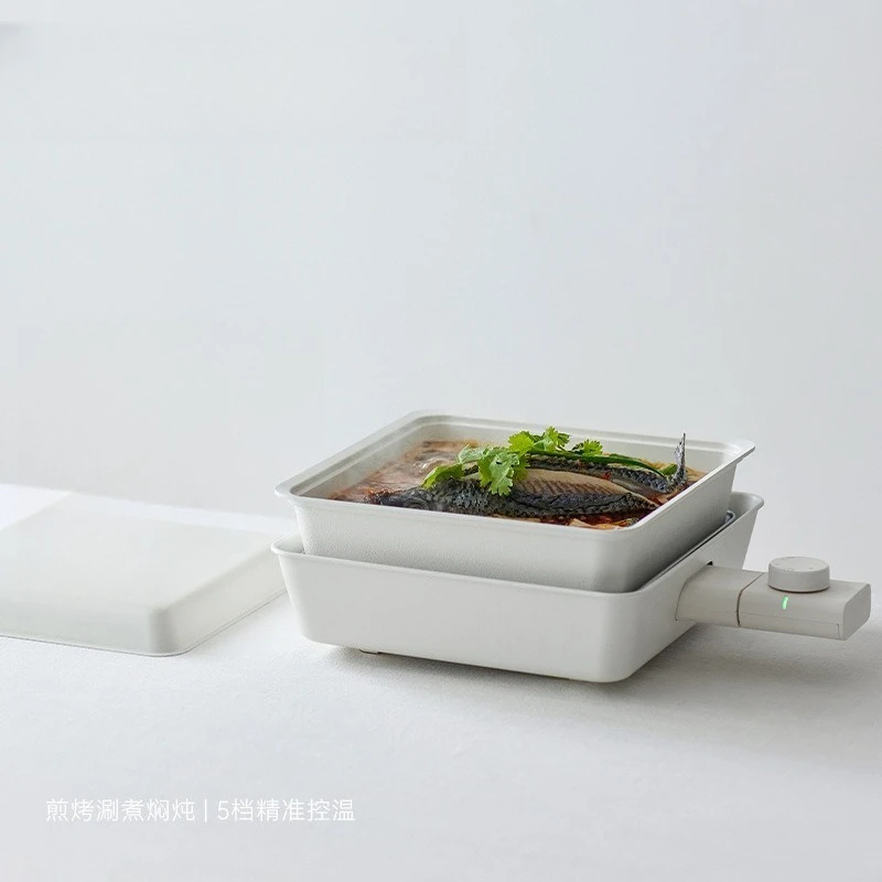 Multi-functional cooking pot, home grilling, shabu-shabu, steaming, frying, frying, stewing, mandarin duck electric hot pot