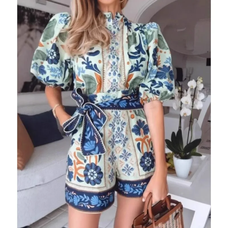 بدلة قفز عصرية لصيف 2025 بدلة لعب نسائية جديدة أنيقة بوهيمية عالية الشارع مطبوعة بحزام واحد الصدر ملابس الشارع الشهير