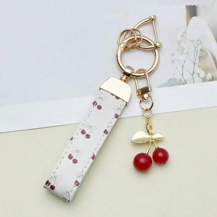 1pc Silky Bow Cherry UV Print Pendant, With Adorable Cherry Charm. Can Be Hung On Door Keys, Bags, Lightweight And Fashionable,