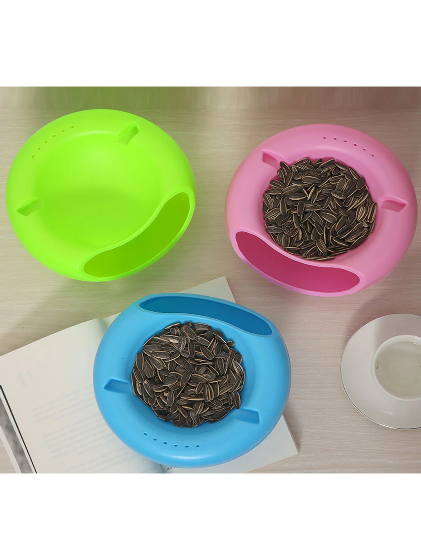 Dual-Layer Snack Bowl with Phone Holder. Detachable Design Stores Nuts, Fruits and Candies, Built with a Practical Waste Bin.