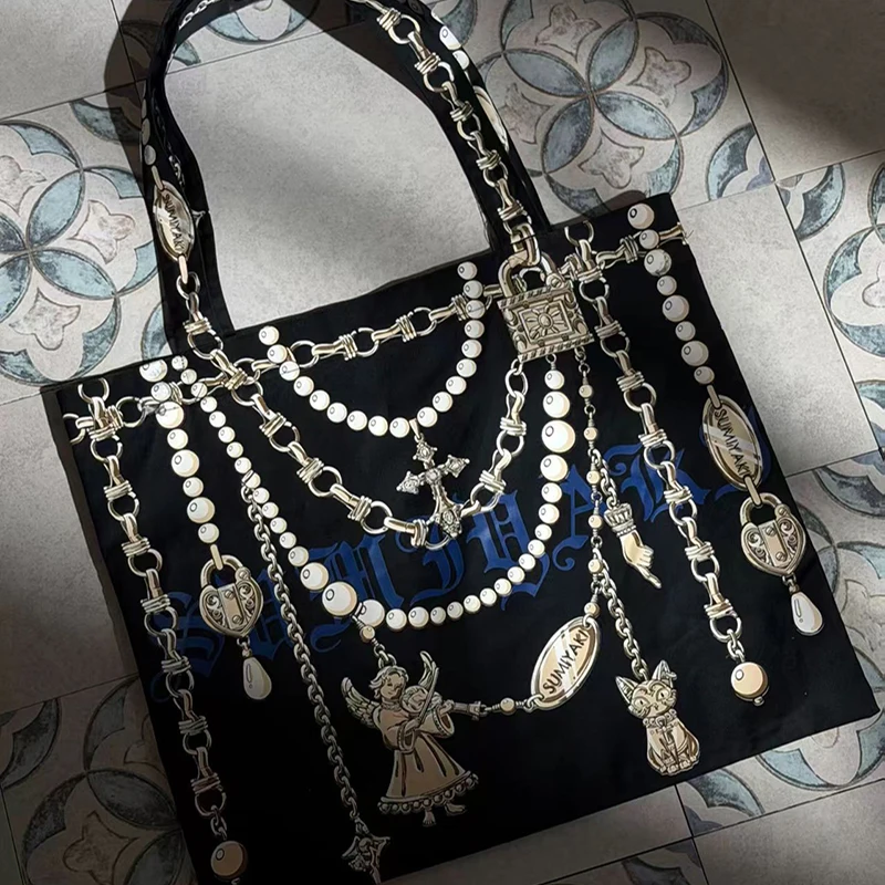 Gotische Schultertasche aus Segeltuch mit Schlossverschluss und Kettenmuster, Damen-Handtasche mit künstlerischem Design, trendige, leichte Einkaufstasche – Detail 4