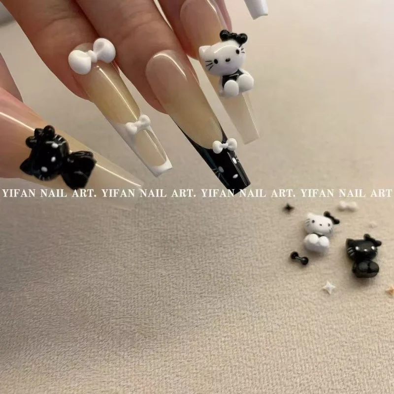 ชาร์มตกแต่งเล็บลายเฮลโลคิตตี้ 50 ชิ้น สีดำขาว คละแบบ น่ารัก 3 มิติ รูปหัวใจและโบว์  อุปกรณ์ตกแต่งเล็บสุดเก๋ น่ารัก สำหรับทำเล็บ