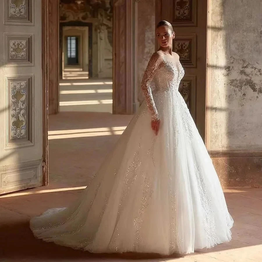 Classique église a-ligne robes de mariée 2026 col transparent paillettes dentelle manches longues Tulle robes de mariée robes de noiva