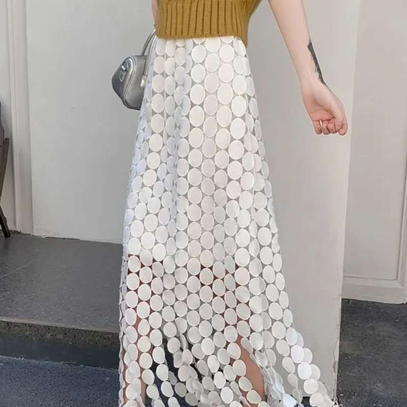 Gonna dritta media lunga a pois sottili a vita alta nuova estate 2025 da donna in tinta unita con frange scavate stile vacanza