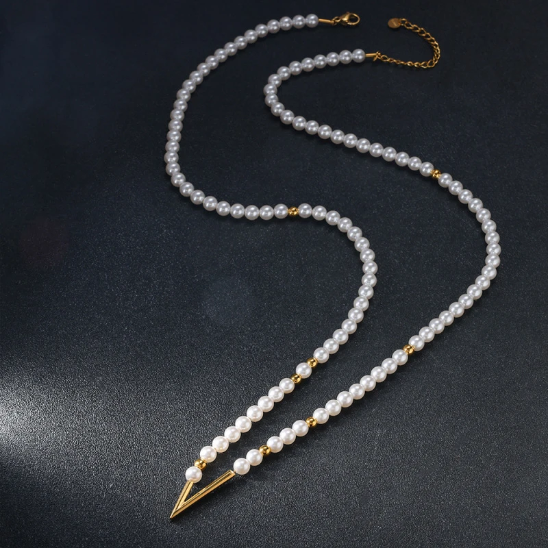 CarlidanaPearl Geometry V Arrow Beaded Necklace Fine bead stitching gold spacer beads for a high-end jewelry look