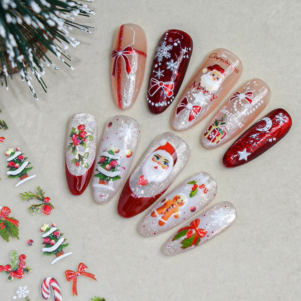 3 bis 15 Blatt 5D Weihnachts-Nagelsticker mit Motiven von Weihnachtsmann, Schneemann, Rentier, Baum, Schneeflocke, Schleife und Zuckerstange, selbstklebend – Detail 9