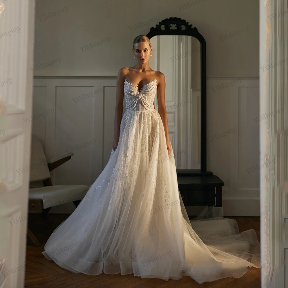 

Shiny Beaded Wedding Dresses Sleeveless Sparkling Bride Gowns Backless A-Line vestidos de novia 2026 Sweep Train Customized