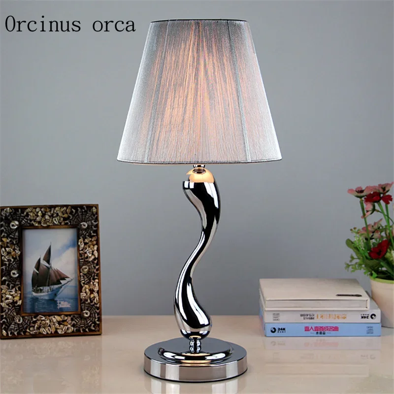 

Simple modern stainless steel iron wire drawing bedroom lamp dimming LED creative personality warm bedlamp