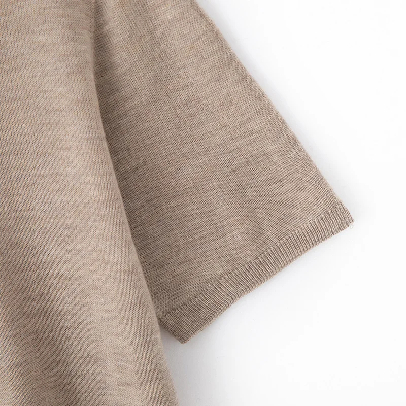 Novedad de verano, suéter tejido de manga corta con cuello redondo, camiseta de lana informal fina de seda helada para mujer, Top holgado con temperamento