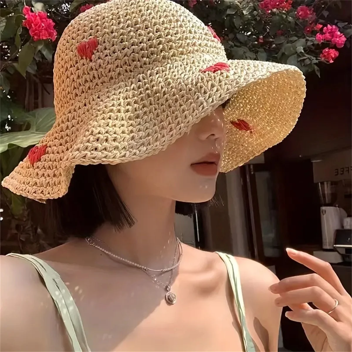 An Insta-style wavy edge large eaves straw fisherman hat women\'s summer braided love straw hat holiday beach breathable sunshade