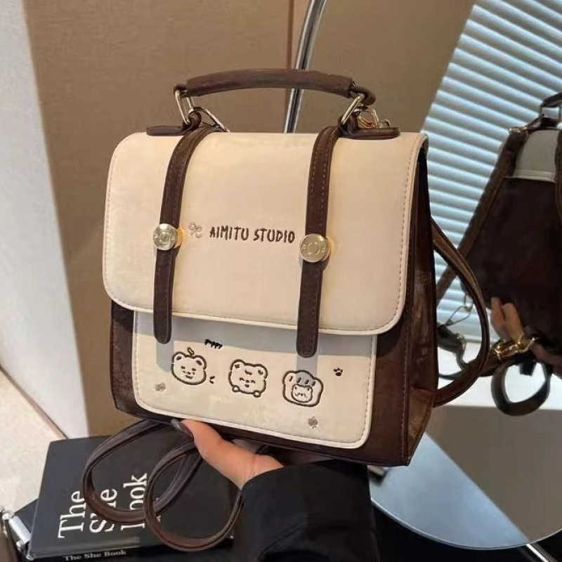 mochila-minimalista-elegante-pequena-chique-casual-versatil-bolsa-de-ombro-moderna-com-textura-elegante