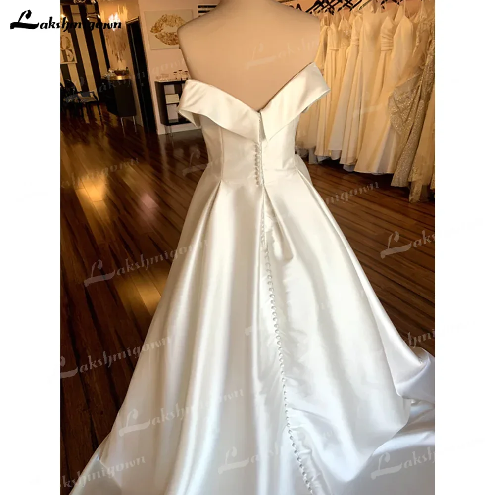 Una línea de vestidos de novia con hombros descubiertos, tren capilla, hecho a medida, satén, escote en forma de corazón, vestidos de novia elegantes, formalesдебное пла