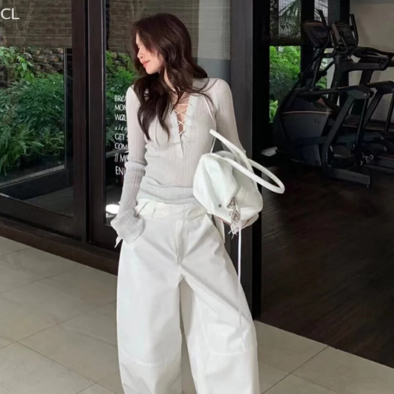 韓国ヴィンテージセクシーな V ネックレースアップ長袖薄いスリムニットトップ女性のための