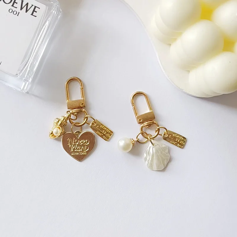 Creative Alloy Shell Pearl Key Chain for Women Cute Conch Pendant Keyring Handbag Ornament Car Key Accessories Small Gifts view 4