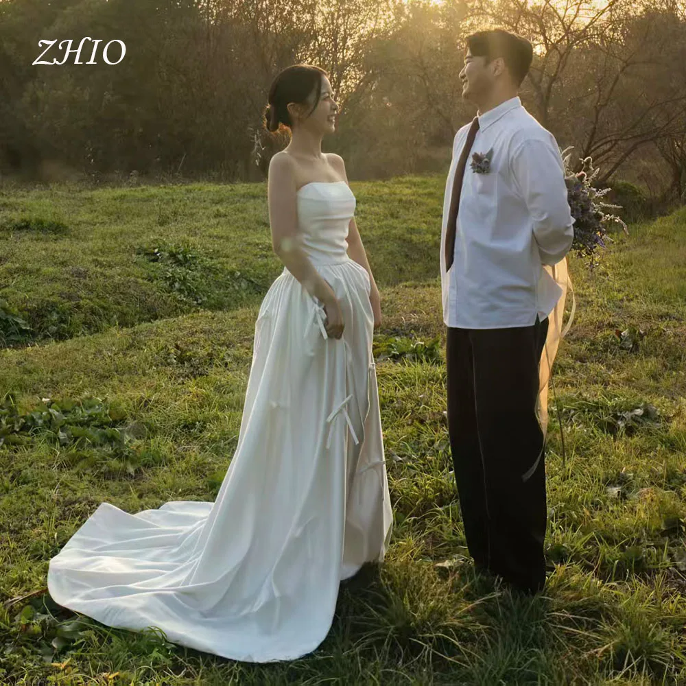 ZHIO فستان زفاف بفيونكة بسيطة بدون حمالات سويب تراين عاجي من الساتان كوري لالتقاط الصور فستان استقبال الزفاف مخصص لحفلات الزفاف #1