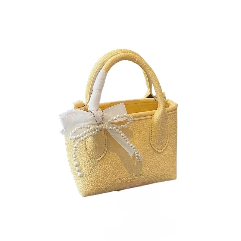 

Milk Yellow Bag Summer Versatile 2026 Super Hot New Korean Version Messenger Bag Fashion, Temperament Commuting Pretty Handbags