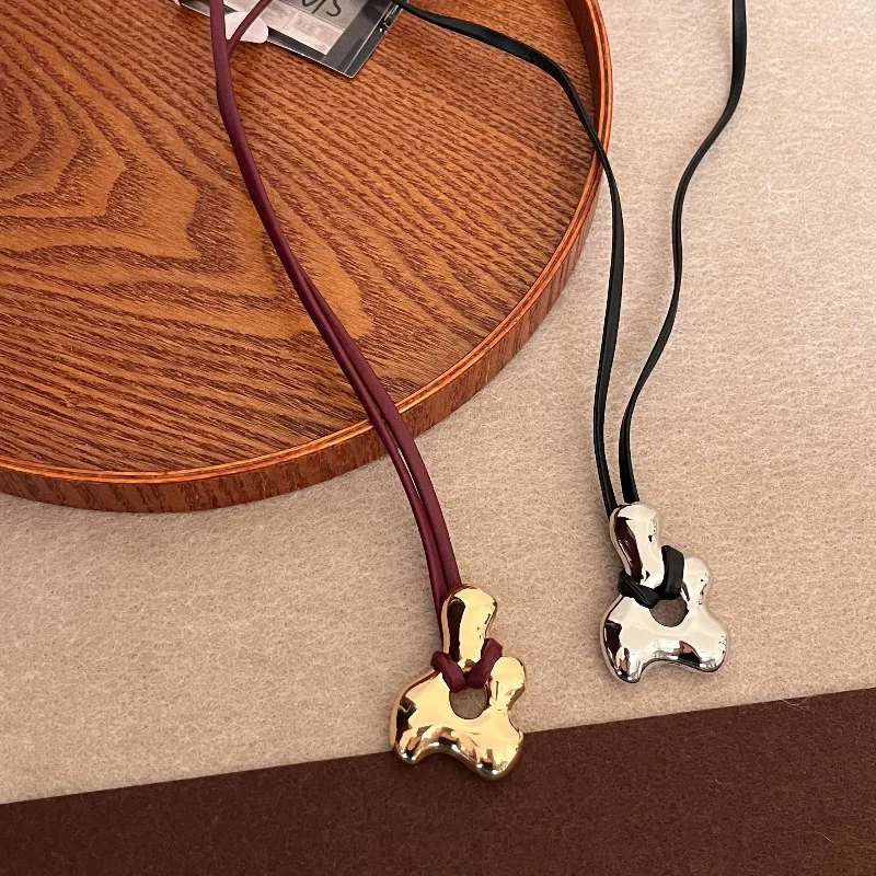 Vintage abstract hollow pendant necklace stylish luxury leather rope adjustable sweater chain accessories