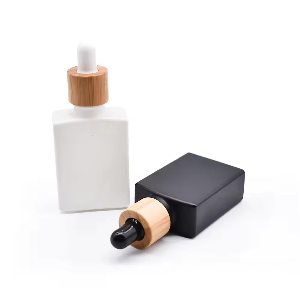 Botella cuentagotas de vidrio de bambú de alta calidad, embalaje cosmético de madera y bambú, botella cuentagotas de vidrio cuadrada, viales, botella de aceite esencial