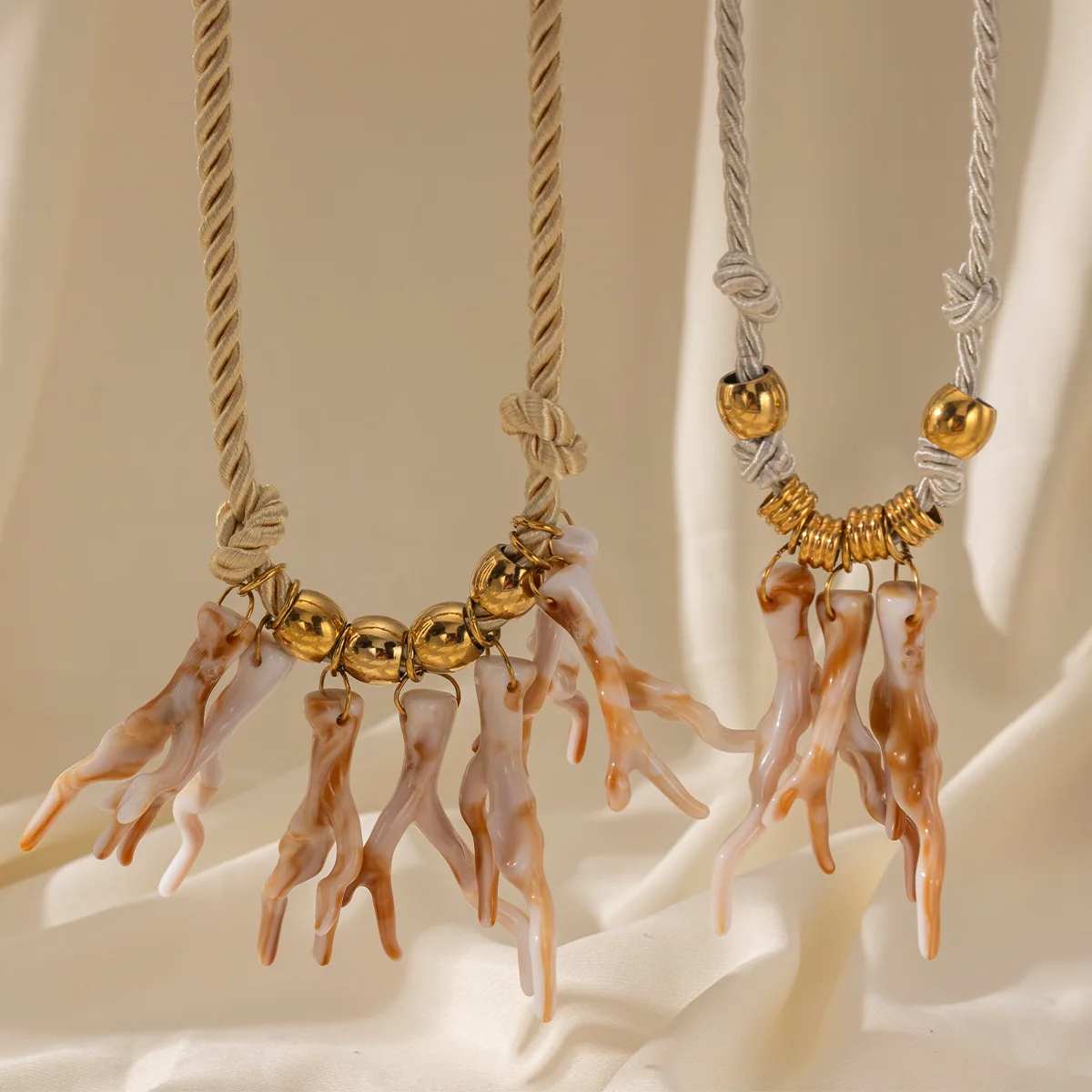 

Coral's multiple pendant necklaces are made of stainless steel and electroplated in the ocean series, which do not fade
