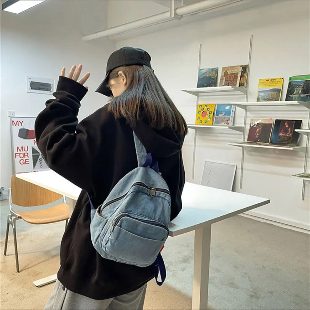 حقيبة ظهر محمولة من قماش الدنيم Y2K على طراز الشارع بسعة كبيرة حقيبة يد كلاسيكية على الطراز الياباني بلون سادة حقيبة كروس صلبة في الهواء الطلق