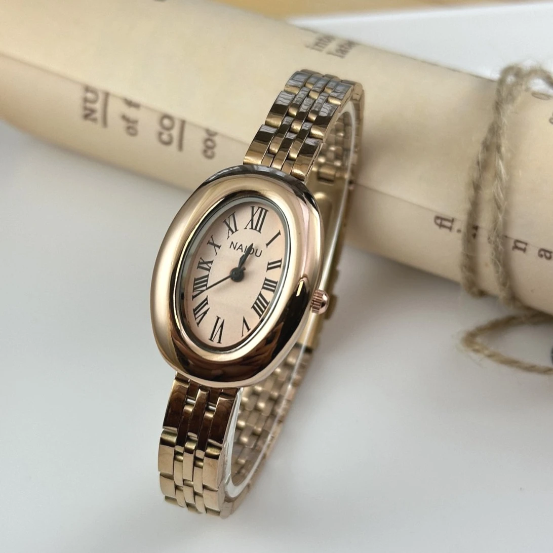 

Лидер продаж, брендовые женские часы с овальным римским циферблатом, модные золотые кварцевые часы, роскошные женские наручные часы, подарок, Relojes Para Mujer