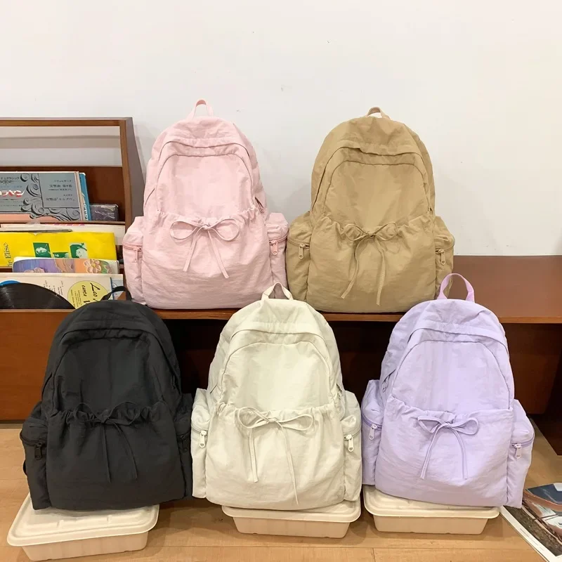 New Student Backpack Women's Japanese Style Lightweight and Fashionable Backpack Solid Color Simple Bow Casual Travel Backpack