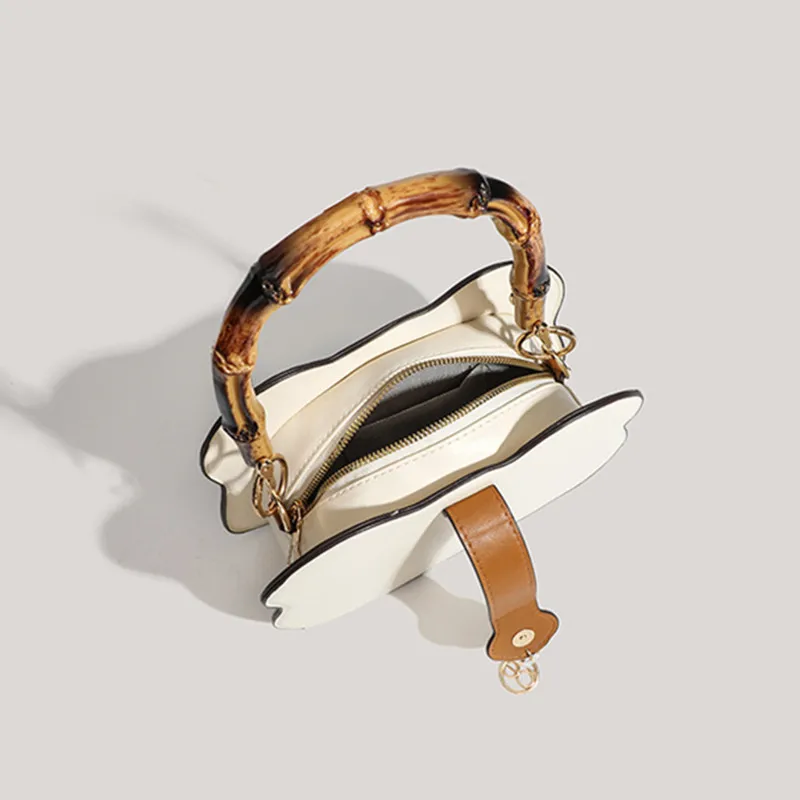 2025 العلامة التجارية الراقية تصميم النمط الصيني الباندا التطريز الرجعية الخيزران مقبض حقائب اليد الفاخرة موضة حقائب كروسبودي حقيبة الزفاف #3