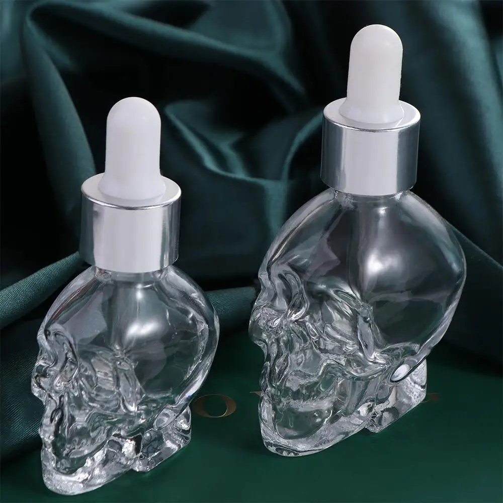 

Glass Dropper Skull Shape Bottle Transparent Empty Glass Liquid Dropper Bottle with Pipette Dispenser Cosmetic Containers