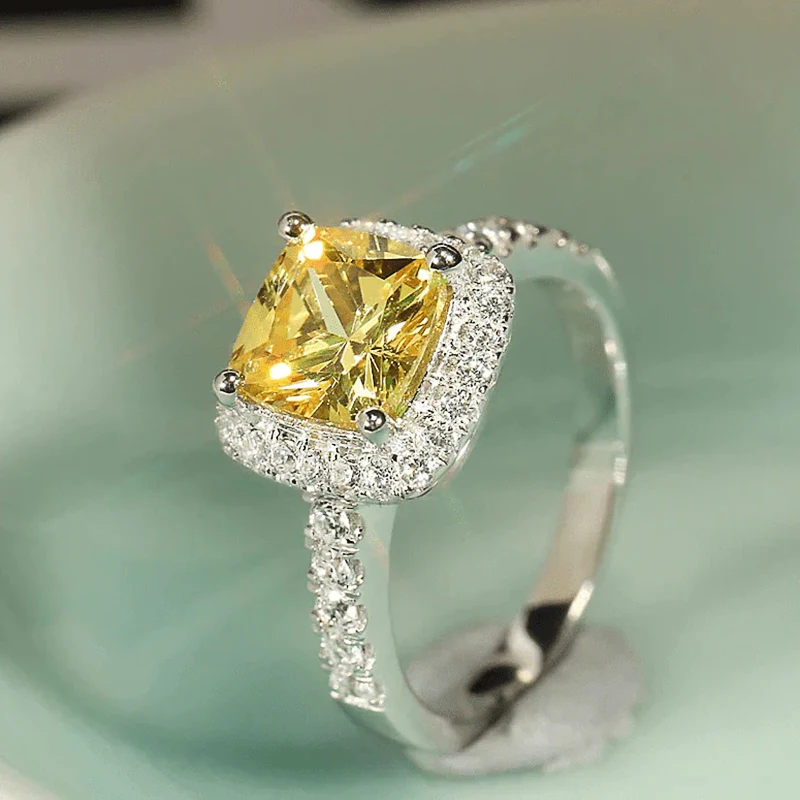Huitan elegante gelbe Zirkonia Frauen Ringe Luxus Hochzeitstag Party Dame neue Accessoires hellen Modeschmuck
