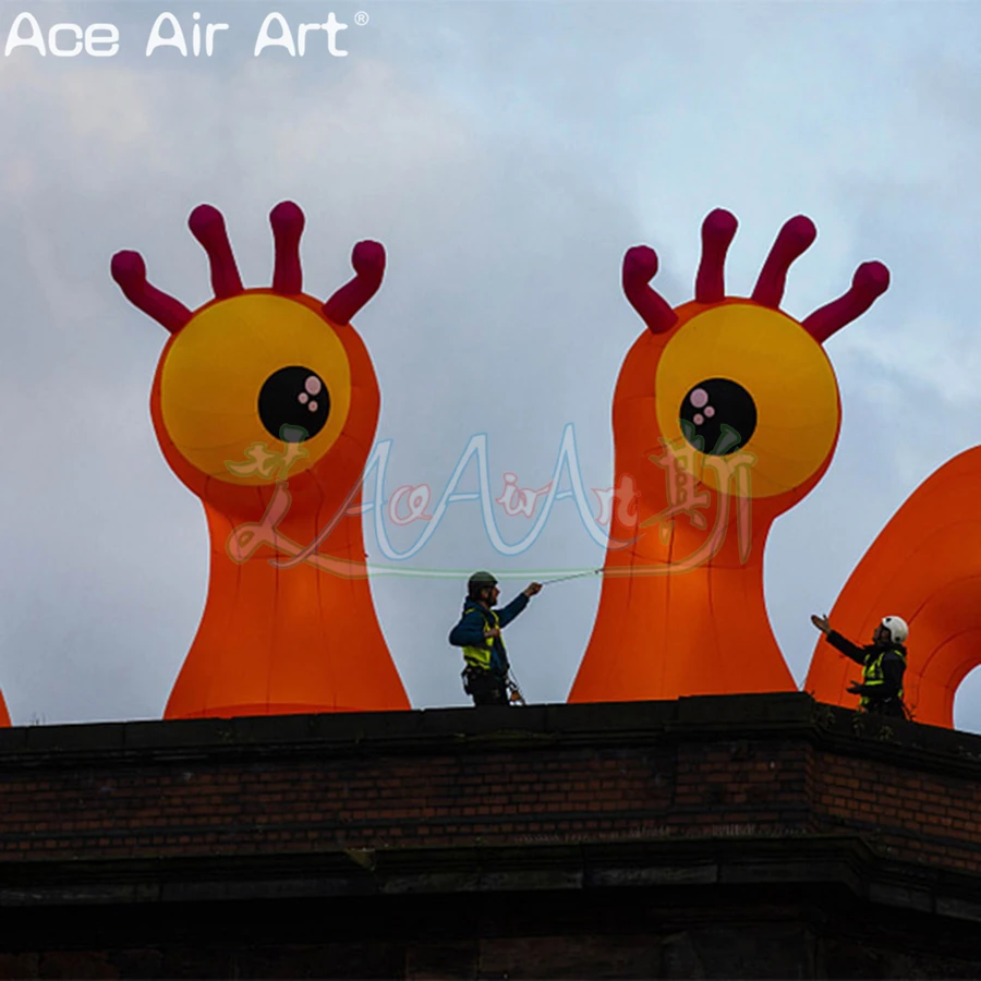 A Pair Cute Inflatable One Eyed Monster Orange Single-eye Biological Models Can Be Added with RGB Lights for Outdoor Activities