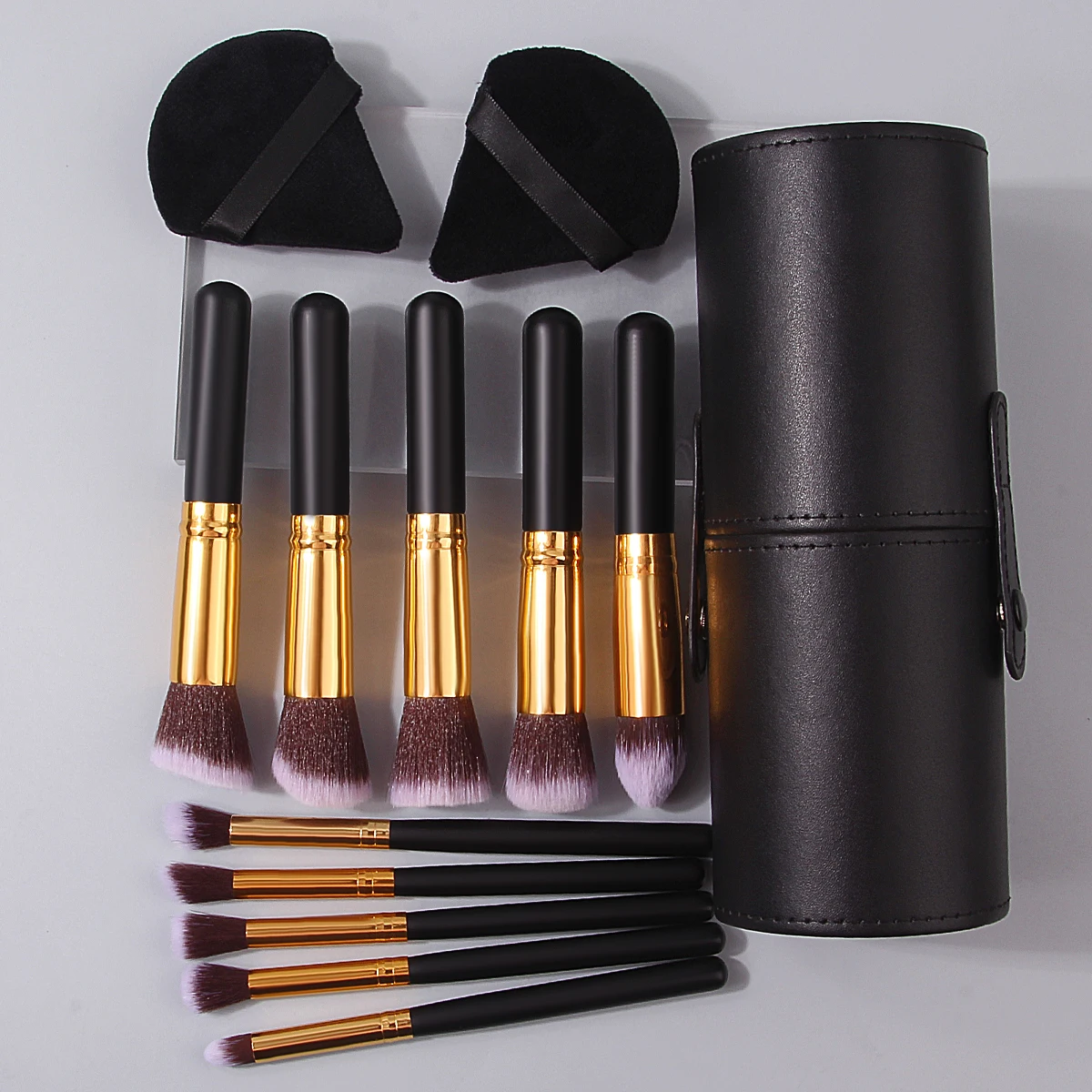 The 13PCS makeup brush set includes a facial makeup brush, a triangular powder puff, and a storage bucket for beauty tools
