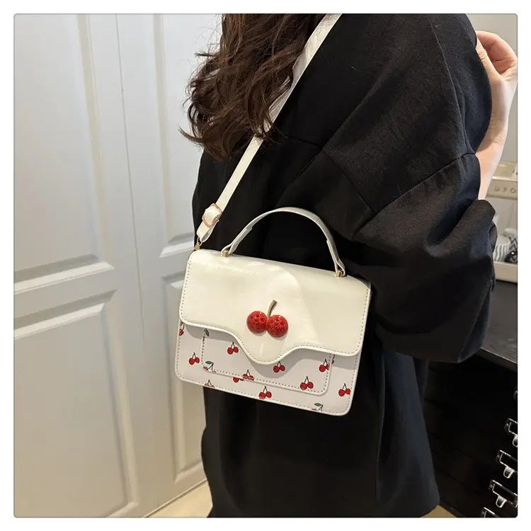

Новинка 2023 года, квадратная женская сумка с вишневым принтом, свежая сумка через плечо с верхней ручкой, игривая и очень универсальная ​